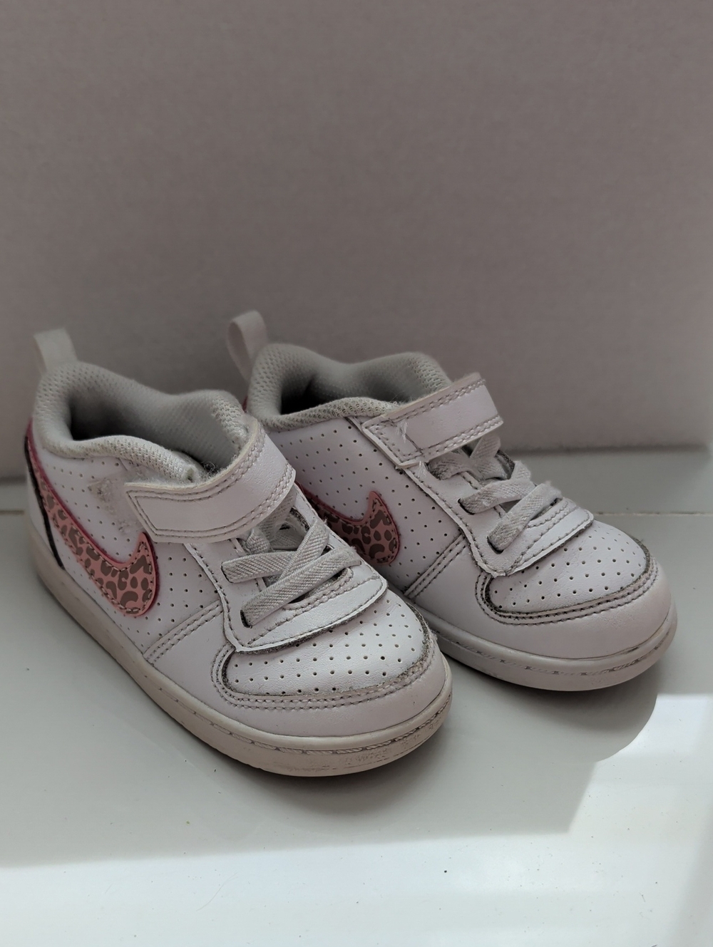 Nike Kids White Sneakers with Pink Leopard Swoosh